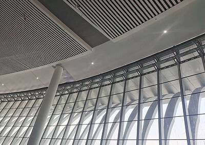 Façade vitrée cintrée avec impostes – exemple de projet, Chine